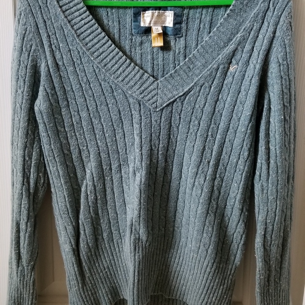 Woman 's sweater.